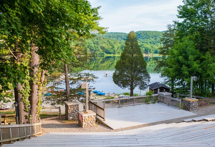 Outdoor amphitheater and waterfront with boats